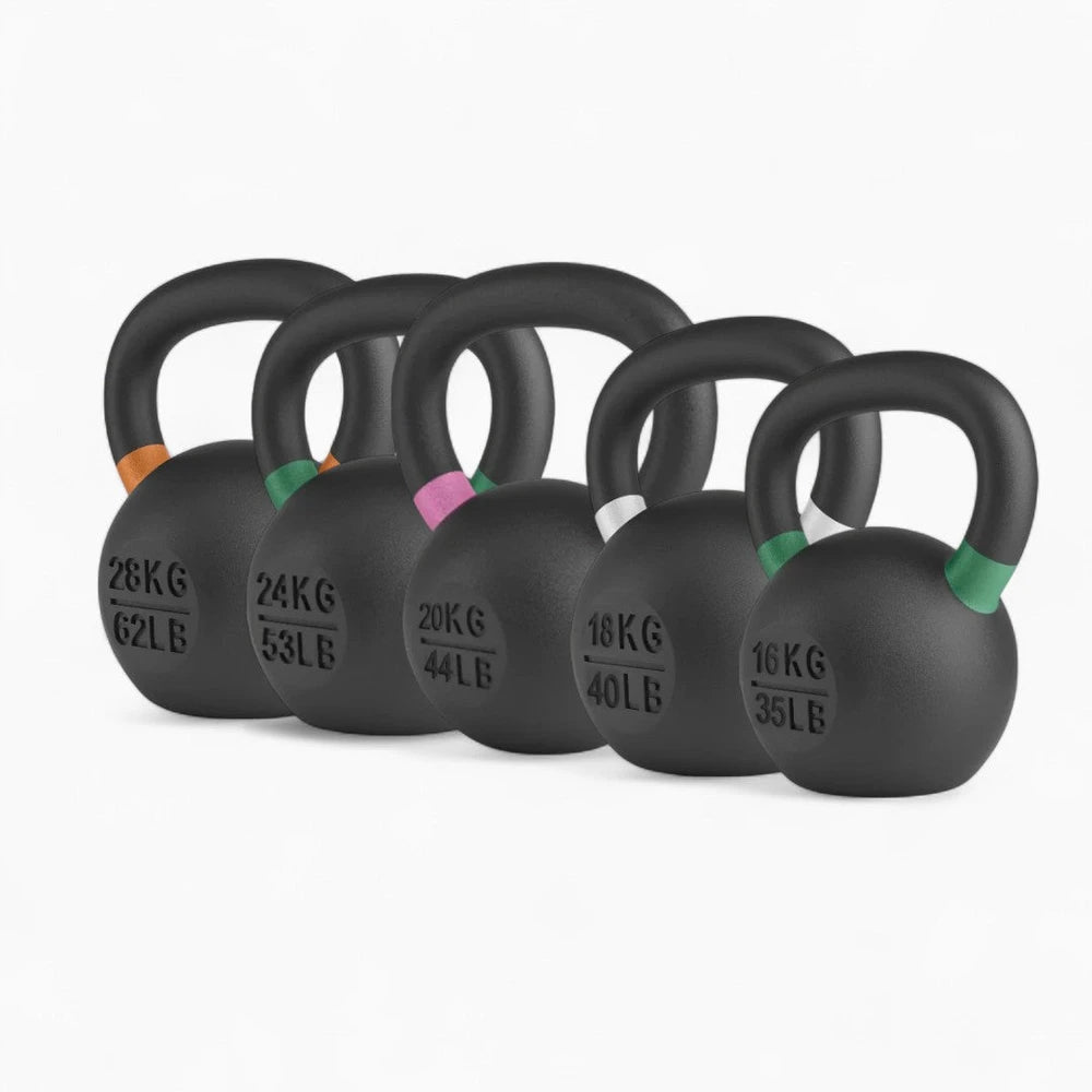 Set of black kettlebells with weight markings on a white background Main image
