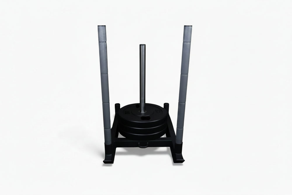 Commercial power sled with weight plates on a white background