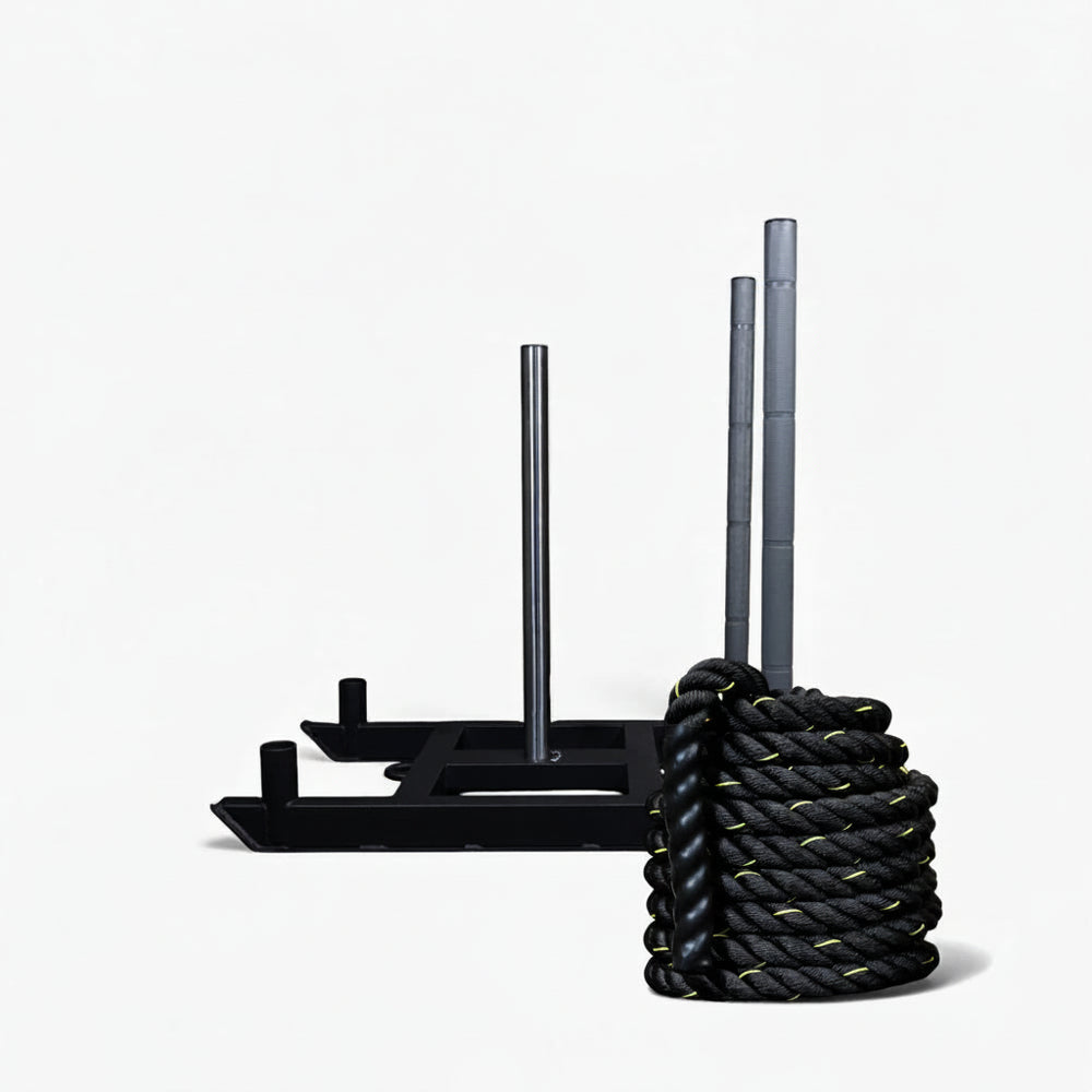 Set of battle rope and power sled on a white background
