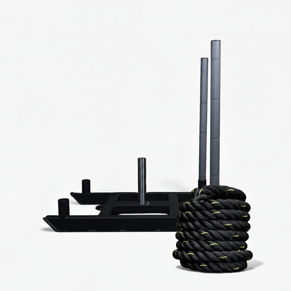 Resistance training system with battle ropes and sled on a white background