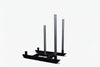 Black metal power sled with three vertical poles on a white background