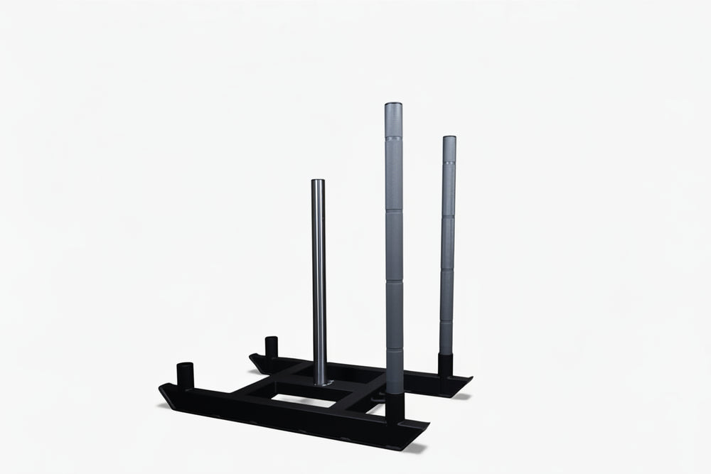 Black metal power sled with three vertical poles on a white background