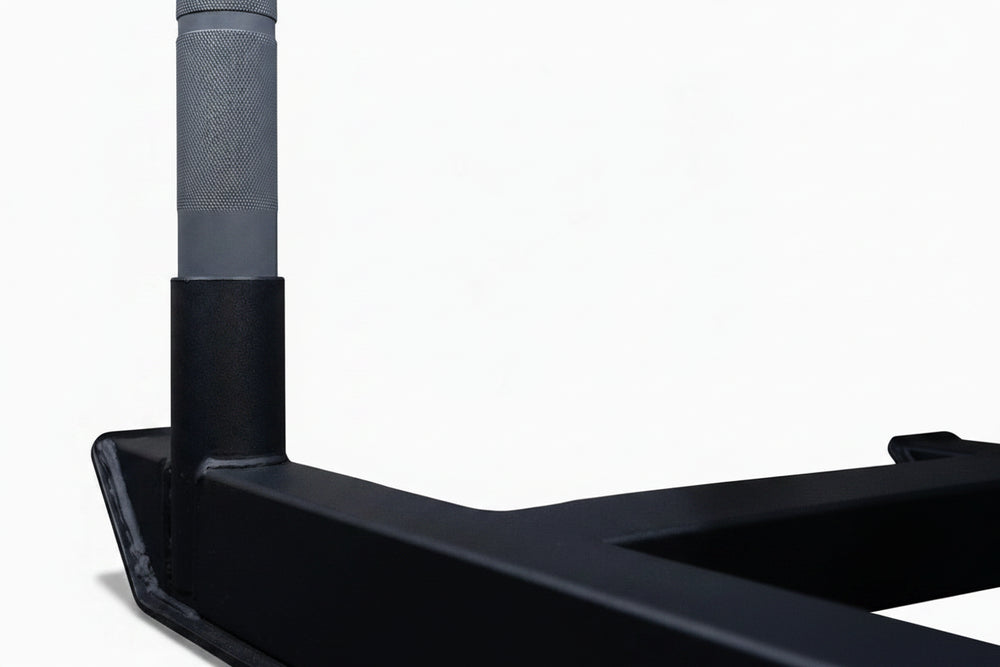 Close-up of a gym power sled on a white background