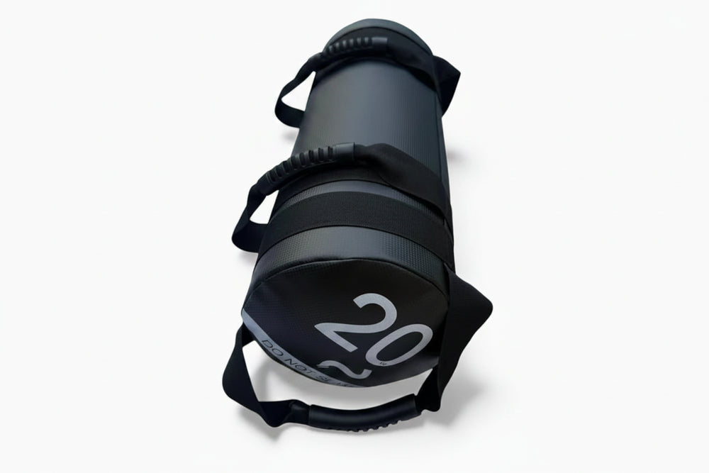 Black sand bag with 20 written on it on a white background