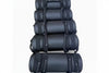 Stack of black gym bags on a white background