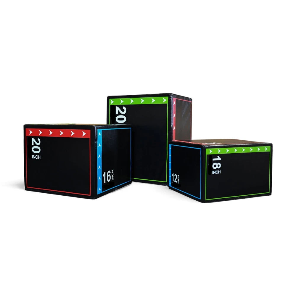Set of three black exercise cubes with measurement markings on a white background