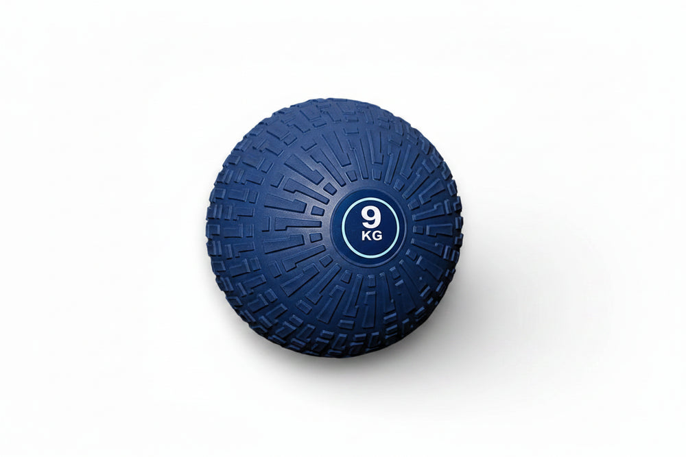 Blue exercise ball with '9 KG' marking on a white background