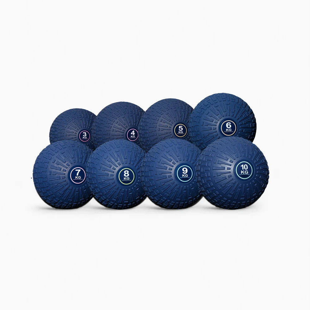 Set of blue weighted balls with weight markings on a white background