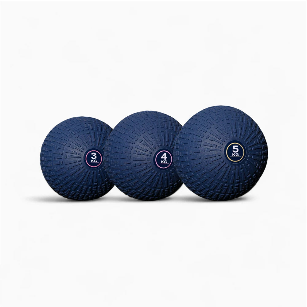 Three blue slam balls with weight labels on a white background