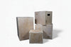Set of wooden weight boxes with visible numbers on a white background