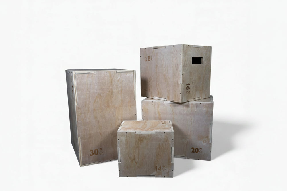 Set of wooden weight boxes with visible numbers on a white background