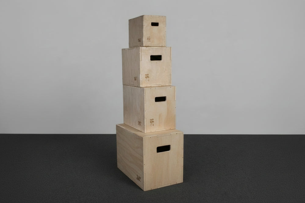 Stack of wooden jump boxes with visible numbers on a gray background