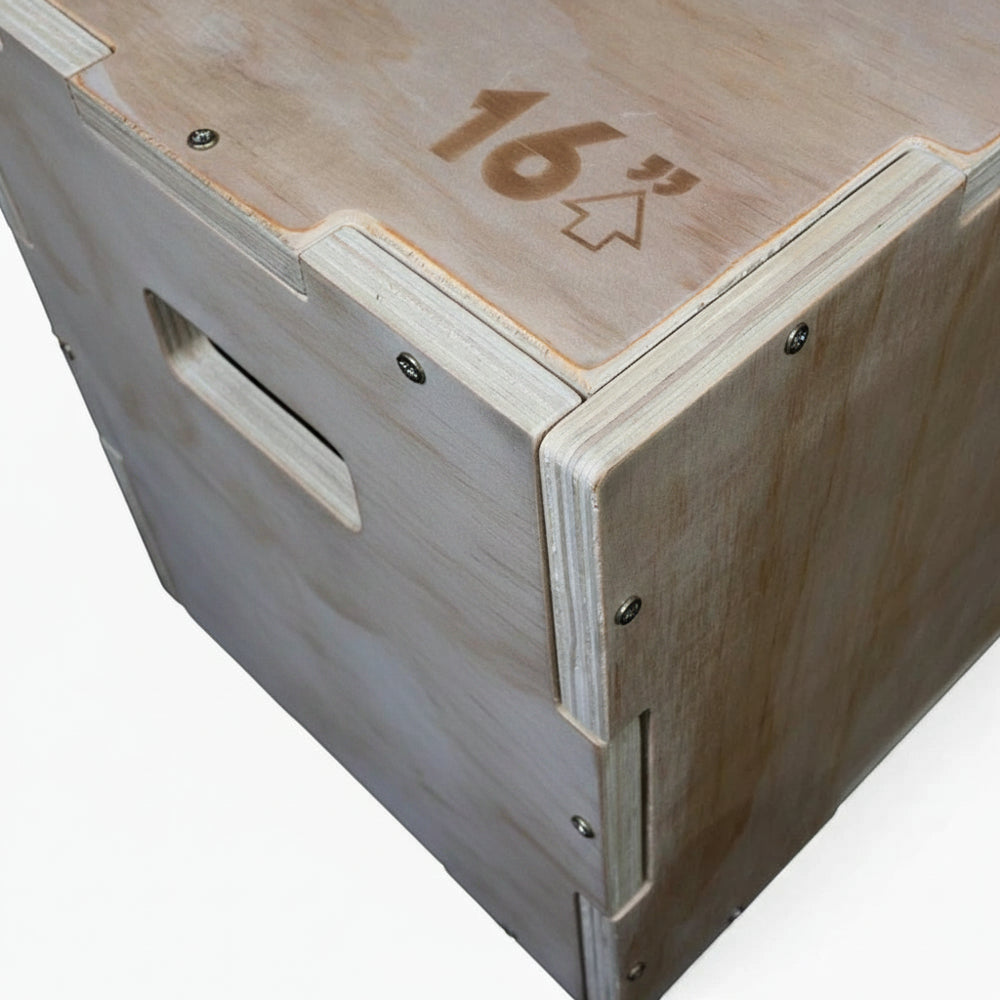 Wooden jump box with '16' on a white background