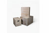Three wooden jump boxes with different sizes stacked on a white background