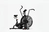 Black exercise bike with fan on a white background
