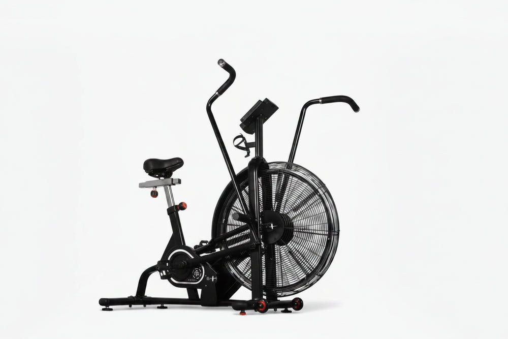 Black exercise bike with fan on a white background