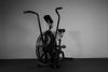 Exercise air bike on a dark background