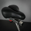 Black bicycle saddle on a dark background