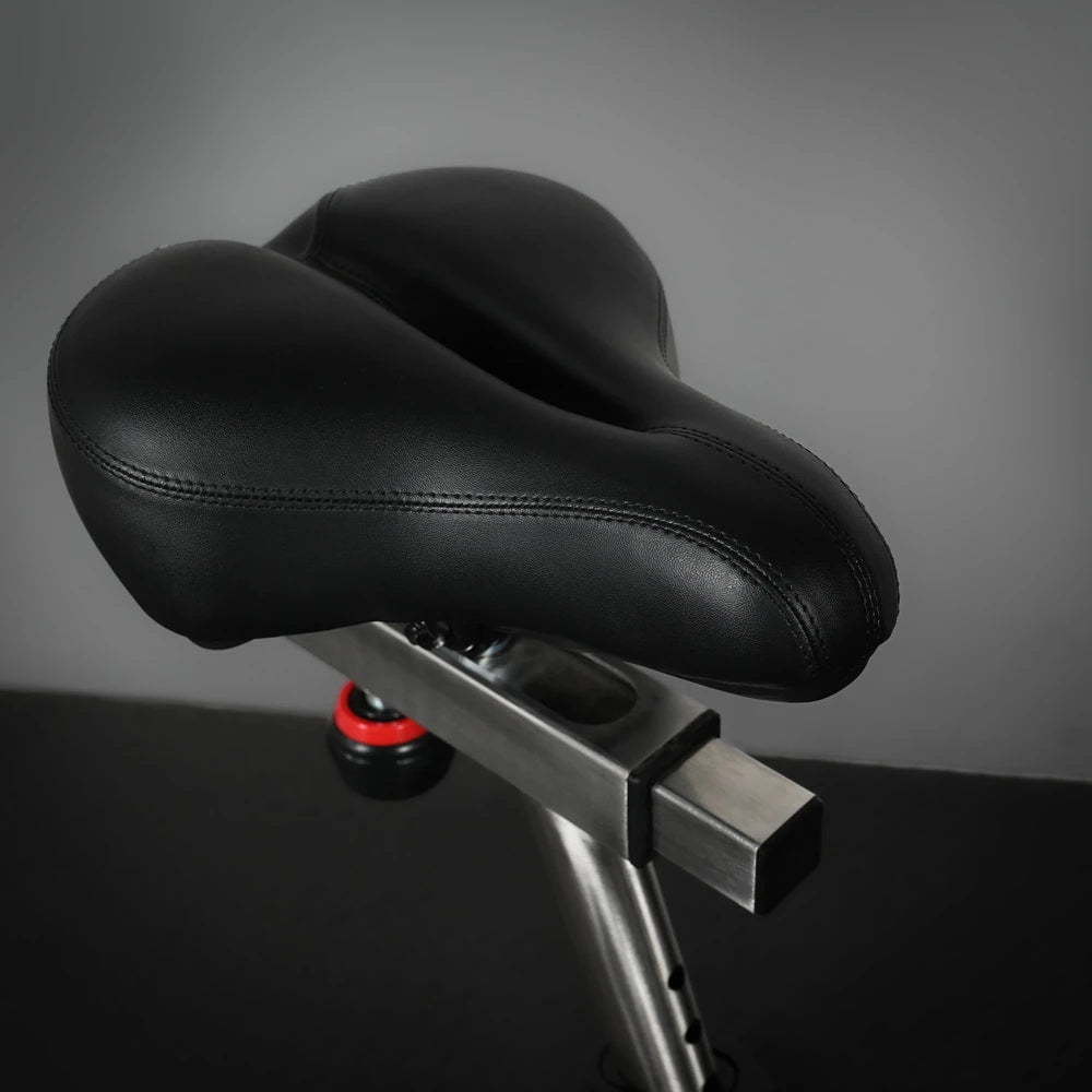 Black bicycle saddle on a dark background