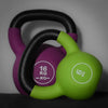 Green and purple kettlebells with '16 KG' marking on a gray background
