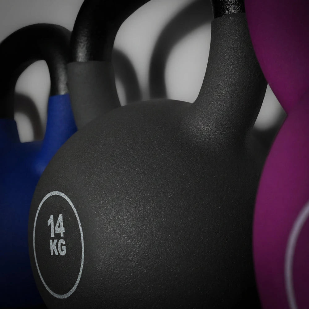 Black kettlebell with '14 KG' marking on a white background
