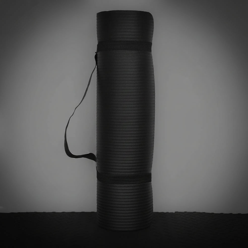 Black gym mat on a gray background