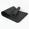 Black yoga mat on a white background