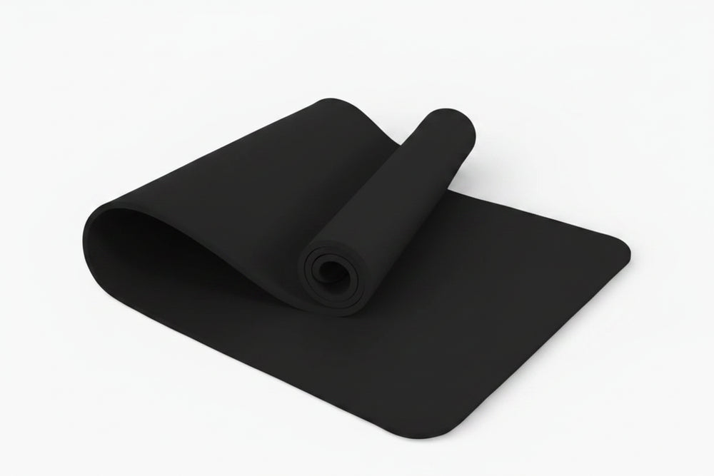 Black yoga mat on a white background
