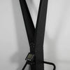 Black exercise ski erg machine on a gray background