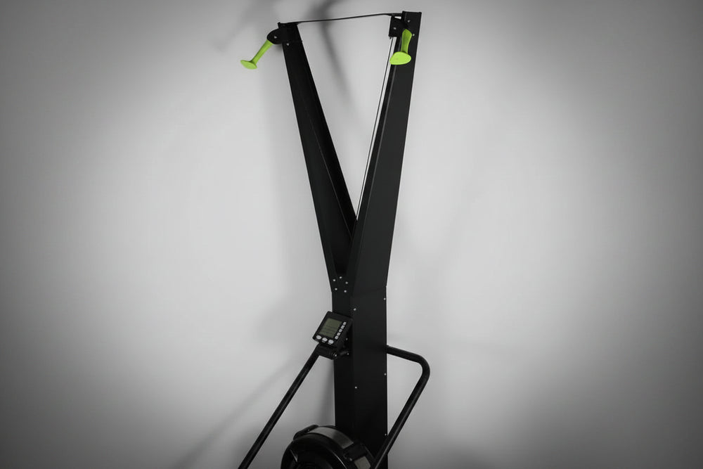 Black ski erg training machine on a gray background