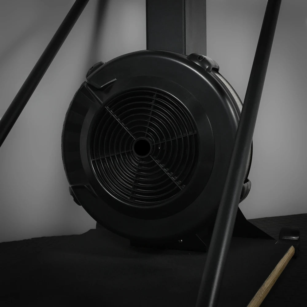 Black ski erg machine on a gray background