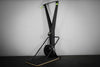 Black ski erg exercise machine on a gray background