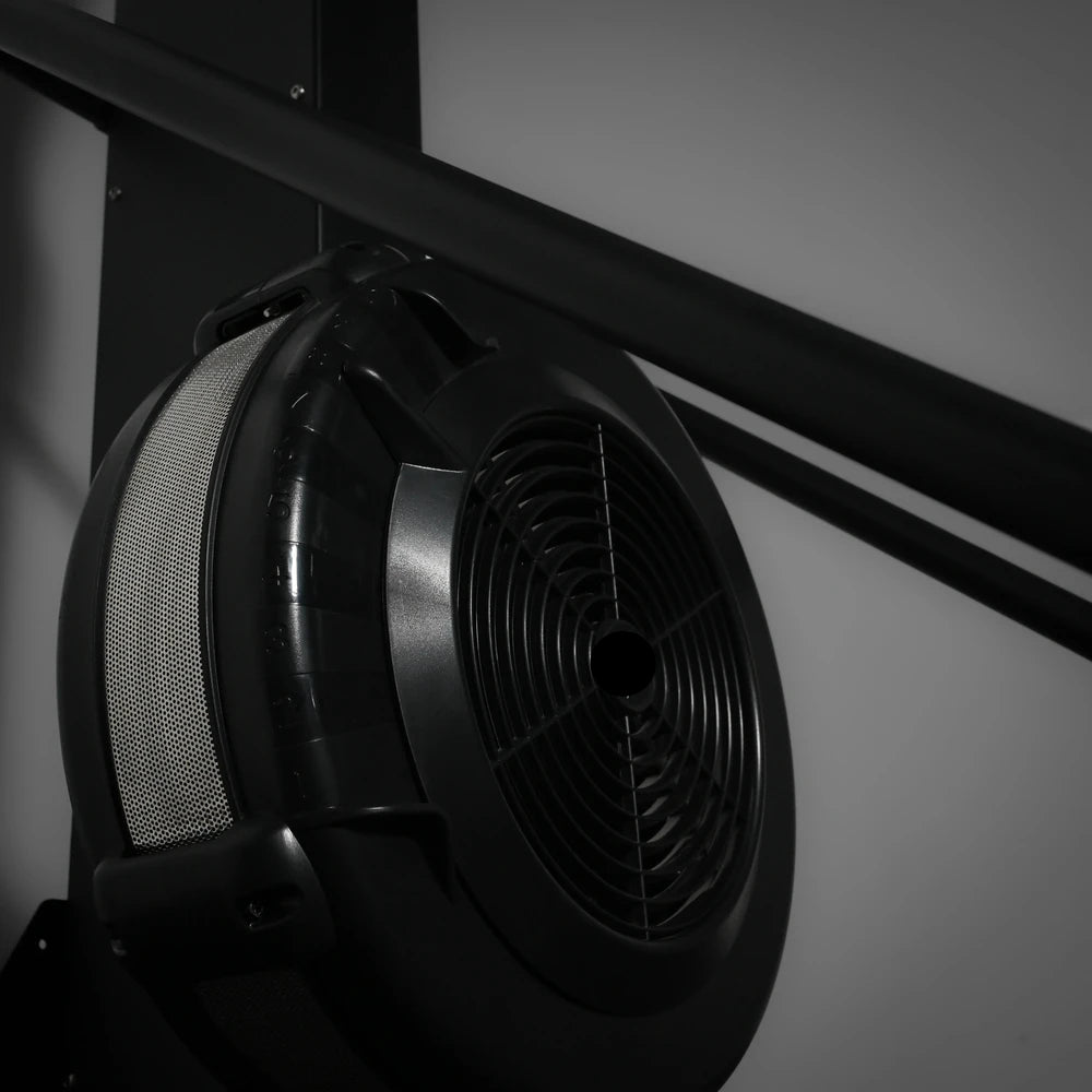 Close up of ski erg against a gray wall