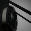 Black ski erg on a grey wall