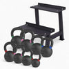 Set of black kettlebells with a weights rack on a white background