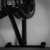 Black exercise bike against a gray background