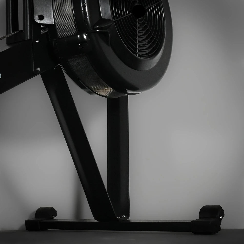 Black exercise bike against a gray background