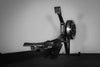 Rowing machine with digital display on a gray background