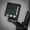 Close-up of a digital display on a piece of exercise equipment with a gray background