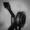 Black row erg machine on a gray background