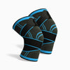 Pair of black and blue knee sleeves on a white background