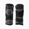 Black and gray knee brace on a white background