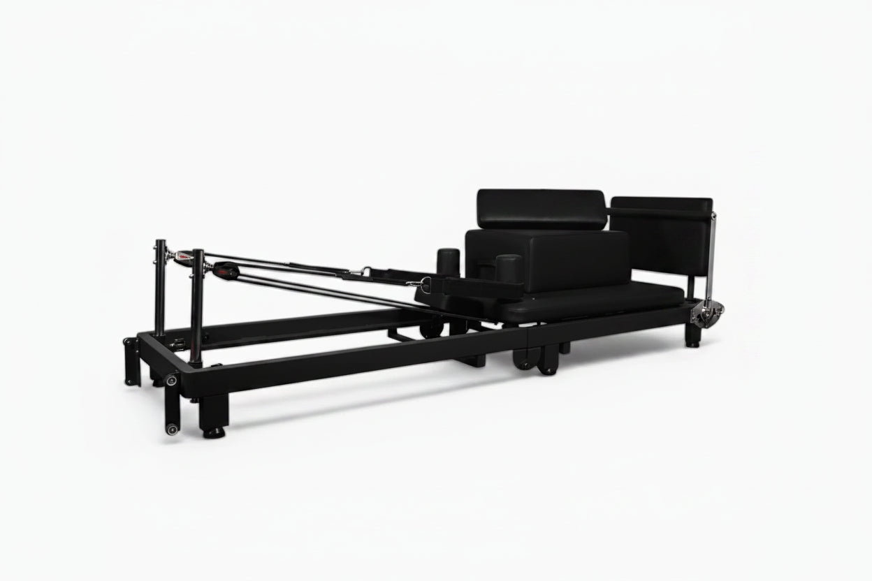 Black Pilates reformer on a white background - Buy Online Pilates Reformer | Gym Superstore