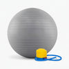 Gray exercise ball with pump on a white background,