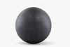 Black exercise ball on a white background