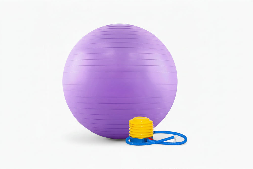 Purple exercise ball with pump on a white background