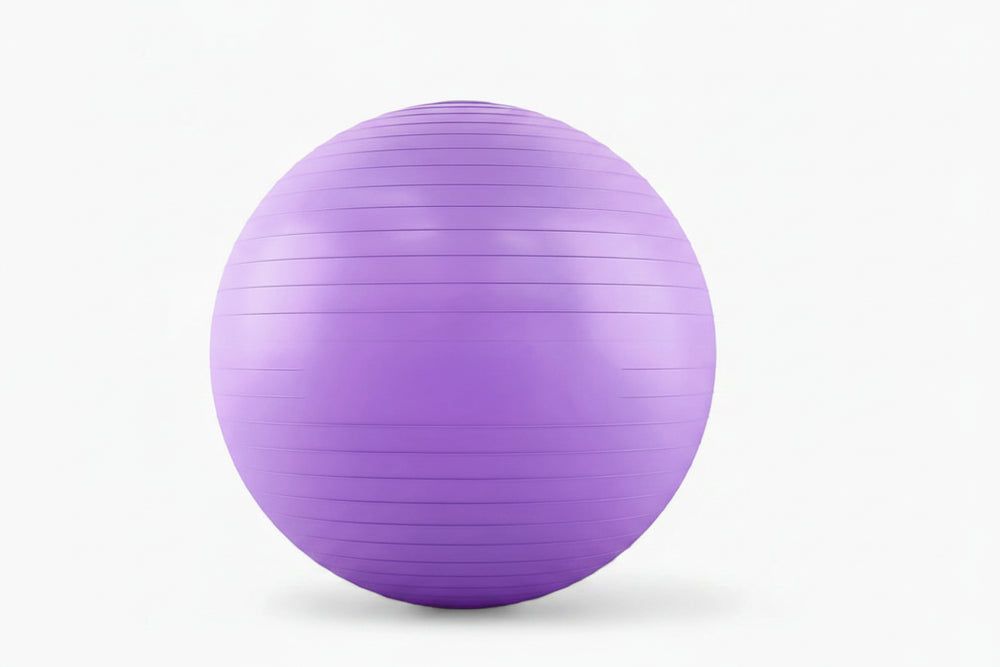 Purple exercise ball on a white background