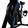 Close-up of a black and blue exercise bike on a white background