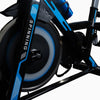 Close-up of a spinning bike with blue and black design on a white background
