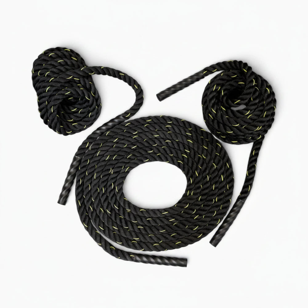 Set of black and yellow rope with gripped ends on a white background
